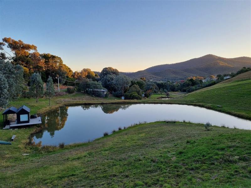 Sunset at Goughs Bay dam and Water Cabin.