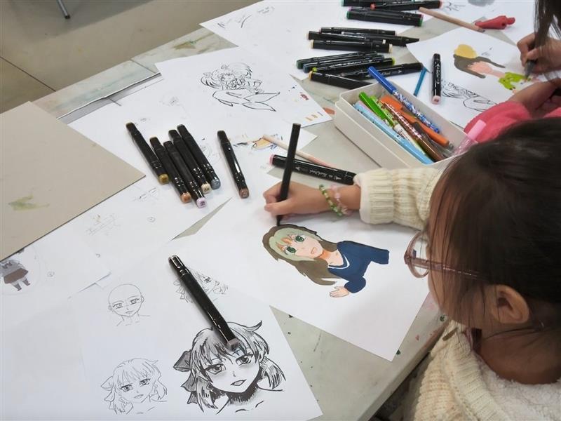 students closeup manga drawing