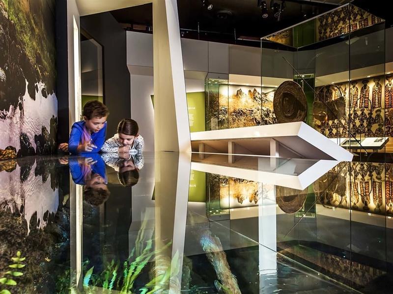 Children discovering First Peoples at Bunjilaka Aboriginal Cultural Centre, Melbourne Museum, Melbourne, Victoria, Australia